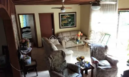 Casa em condomínio fechado com 4 quartos à venda na Rua General Salvador Pinheiro, 258, Vila Jardim, Porto Alegre, 230 m2 por R$ 1.200.000