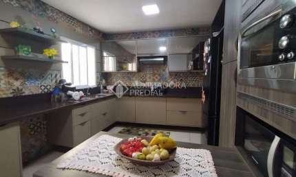 Casa em condomínio fechado com 4 quartos à venda na Rua Lindolfo Collor, 448, Morada do Vale III, Gravataí, 200 m2 por R$ 634.940