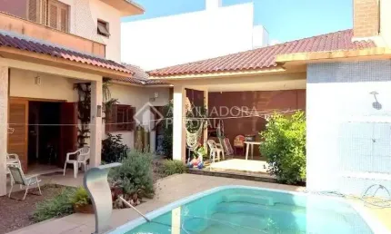 Casa em condomínio fechado com 3 quartos à venda na Rua Eroni Soares Machado, 104, Hípica, Porto Alegre, 322 m2 por R$ 960.000