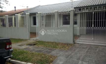 Casa em condomínio fechado com 3 quartos à venda na Rua das Araucárias, 1090, Harmonia, Canoas, 115 m2 por R$ 700.000