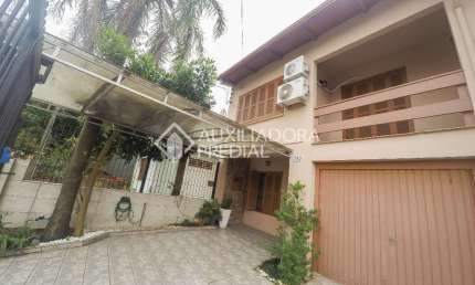 Casa em condomínio fechado com 4 quartos à venda na Rua Evangelina Porto, 140, Vila João Pessoa, Porto Alegre, 156 m2 por R$ 800.000