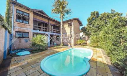 Casa em condomínio fechado com 5 quartos à venda na Rua América, 581, Morro do Espelho, São Leopoldo, 427 m2 por R$ 1.300.000