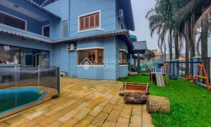 Casa em condomínio fechado com 4 quartos à venda na Rua Doutor Ladislau Ruttkay, 16, Sarandi, Porto Alegre, 332 m2 por R$ 1.250.000