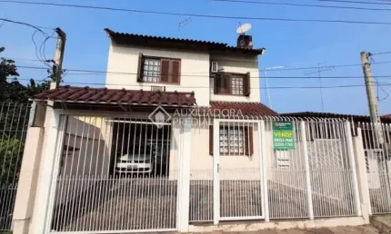 Casa com 3 quartos à venda na Rua Integração, 348, Jardim Algarve, Alvorada, 250 m2 por R$ 430.000