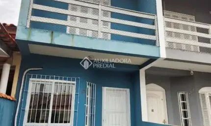 Casa com 2 quartos à venda na Rua Flamingos, 121, Jardim Algarve, Alvorada, 74 m2 por R$ 249.900