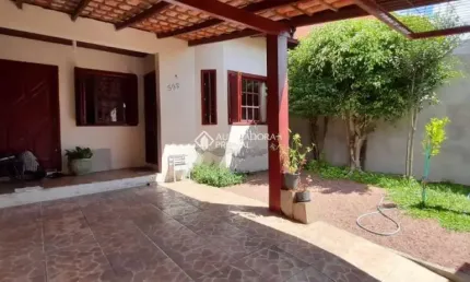 Casa com 4 quartos à venda na Rua Condores, 502, Jardim Algarve, Alvorada, 94 m2 por R$ 300.000