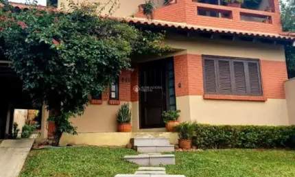 Casa com 3 quartos à venda na Avenida Elmira Pereira Silveira, 1033, Jardim Algarve, Alvorada, 230 m2 por R$ 890.000
