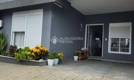 Casa com 3 quartos à venda na Rua Beija-Flores, 371, Jardim Algarve, Alvorada, 134 m2 por R$ 450.000