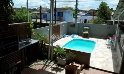 Casa com 3 quartos à venda na Gralhas, 131, Jardim Algarve, Alvorada, 113 m2 por R$ 310.000