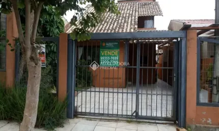Casa com 3 quartos à venda na Rua Corujas, 635, Jardim Algarve, Alvorada, 120 m2 por R$ 400.000