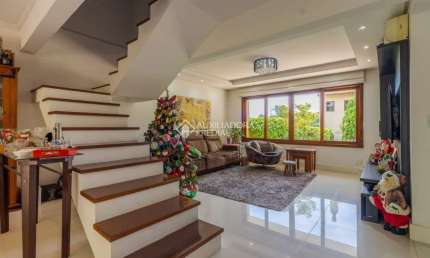 Casa em condomínio fechado com 3 quartos à venda na Estrada João de Oliveira Remião, 1761, Agronomia, Porto Alegre, 241 m2 por R$ 849.000