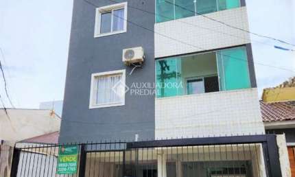 Apartamento com 2 quartos à venda na Rua Pedro Cláudio Monassa, 1298, Jardim Algarve, Alvorada, 61 m2 por R$ 245.000