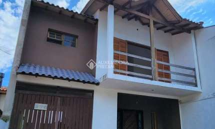 Casa com 3 quartos à venda na Avenida Zero Hora, 580, Jardim Algarve, Alvorada, 160 m2 por R$ 475.000