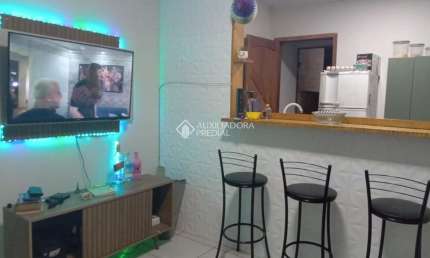 Casa com 1 quarto à venda na Rua Curiós, 387, Jardim Algarve, Alvorada, 45 m2 por R$ 190.000