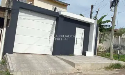 Casa com 5 quartos à venda na Rua Cento e Trinta e Cinco, 294, Jardim Algarve, Alvorada, 150 m2 por R$ 410.000