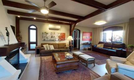 Casa em condomínio fechado com 3 quartos à venda na rua inhanduí, 252, cristal, porto alegre, 309 m2 por r$ 1.600.000