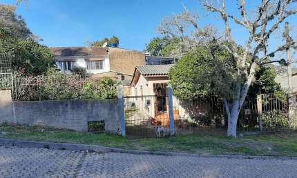 Casa com 3 quartos à venda na Rua Tijuca, 67, Medianeira, Porto Alegre, 100 m2 por R$ 479.000