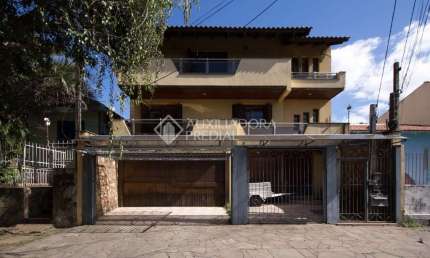 Casa com 4 quartos à venda na Rua Pinto da Rocha, 383, Partenon, Porto Alegre, 250 m2 por R$ 900.000