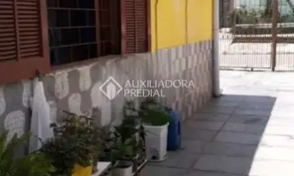 Casa com 4 quartos à venda na rua cento e trinta e cinco, 385, jardim algarve, alvorada, 98 m2 por r$ 270.000