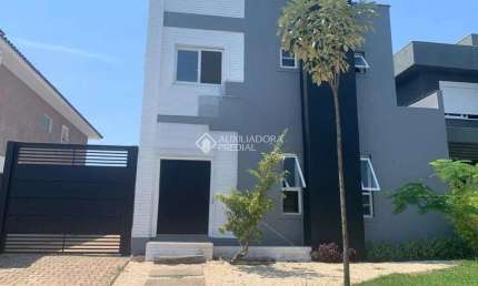 Casa em condomínio fechado com 3 quartos à venda na Avenida Senador Salgado Filho, 8500, Jardim Krahe, Viamão, 220 m2 por R$ 1.500.000
