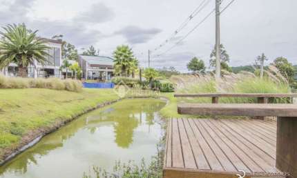 Terreno em condomínio fechado à venda na Avenida Liberdade, 4000, Santa Isabel, Viamão, 1000 m2 por R$ 223.405