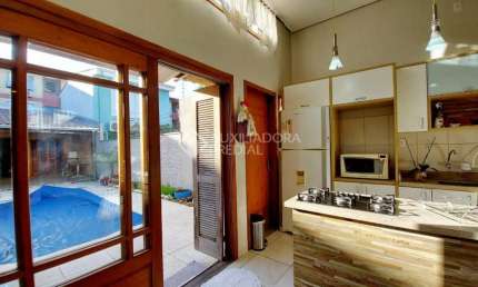 Casa em condomínio fechado com 3 quartos à venda na Rua Barão do Amazonas, 2057, Partenon, Porto Alegre, 110 m2 por R$ 630.000
