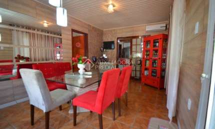 Casa em condomínio fechado com 3 quartos à venda na Rua Dom Vitório Monego, 101, Cruzeiro, Gravataí, 200 m2 por R$ 500.000