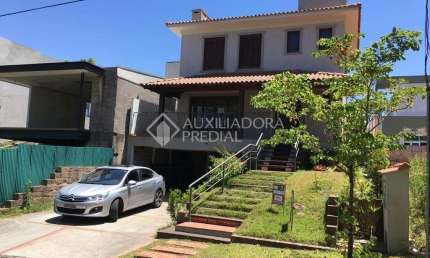 Casa em condomínio fechado com 3 quartos à venda na Avenida Senador Salgado Filho, 8501, Jardim Krahe, Viamão, 234 m2 por R$ 1.856.000