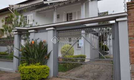 Casa em condomínio fechado com 3 quartos à venda na Rua Cecília Meireles, 692, Marechal Rondon, Canoas, 249 m2 por R$ 2.190.000