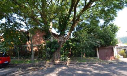 Casa com 4 quartos à venda na Rua Altos da Amapá, 100, Vila Nova, Porto Alegre, 389 m2 por R$ 700.000