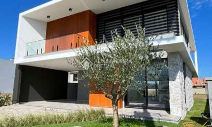 Casa em condomínio fechado com 4 quartos à venda na Ipanema, 0800, Curumim, Capão da Canoa, 300 m2 por R$ 2.700.000