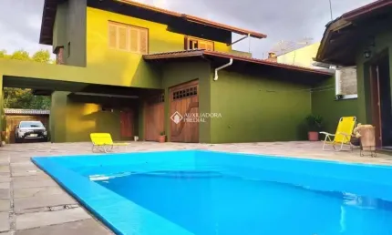 Casa em condomínio fechado com 3 quartos à venda na Rua Paulino Frizzo, 37, Desvio Rizzo, Caxias do Sul, 249 m2 por R$ 1.270.000