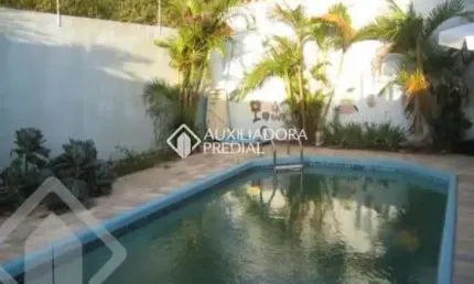 Casa com 3 quartos à venda na CARLOS DE MOURA E CUNHA, DOUTOR, 12, Centro, Guaíba, 167 m2 por R$ 950.000