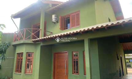 Casa com 2 quartos à venda na Avenida Florida, 929, Flórida, Guaíba, 276 m2 por R$ 800.000