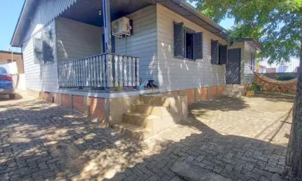 Casa com 4 quartos à venda na JOSE VALDIR GARCIA, 34, Columbia City, Guaíba, 130 m2 por R$ 400.000