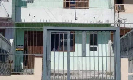 Casa com 3 quartos à venda na Avenida Vasco Alves Pereira, 9, Morada da Colina, Guaíba, 99 m2 por R$ 380.000