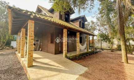 Casa com 2 quartos à venda na Avenida Assis Brasil, 249, Flórida, Guaíba, 113 m2 por R$ 590.000