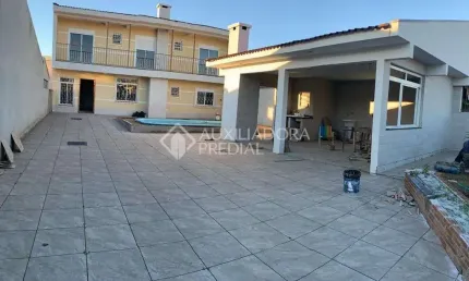 Casa em condomínio fechado com 4 quartos à venda na Rua Província de São Pedro, 100, Jardim dos Lagos, Guaíba, 177 m2 por R$ 620.000