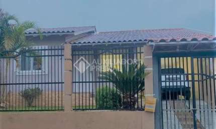 Casa em condomínio fechado com 3 quartos à venda na Rua Toríbio Cambará, 254, Jardim dos Lagos, Guaíba, 145 m2 por R$ 430.000