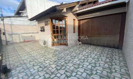 Casa em condomínio fechado com 2 quartos à venda na Rua César Passarinho, 115, Jardim dos Lagos, Guaíba, 124 m2 por R$ 450.000