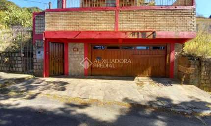 Casa em condomínio fechado com 3 quartos à venda na Rua Aladim de Araújo Pinto, 353, Centro, Guaíba, 308 m2 por R$ 1.590.000