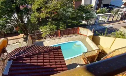 Casa em condomínio fechado com 3 quartos à venda na Rua Aladim de Araújo Pinto, 353, Centro, Guaíba, 308 m2 por R$ 1.590.000