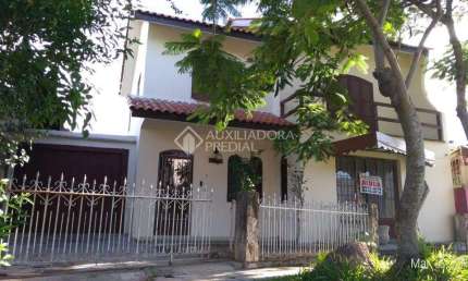 Casa em condomínio fechado com 4 quartos à venda na Rua Sergipe, 242, Parque 35, Guaíba, 300 m2 por R$ 659.000