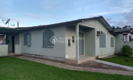 Casa em condomínio fechado com 3 quartos à venda na DAVID RIOS PINTO   ANTIGA B2, 304, Morada da Colina, Guaíba, 116 m2 por R$ 300.000