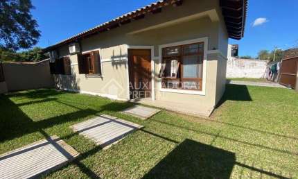 Casa em condomínio fechado com 3 quartos à venda na Rua Victor Scalco, 340, Engenho, Guaíba, 140 m2 por R$ 730.000