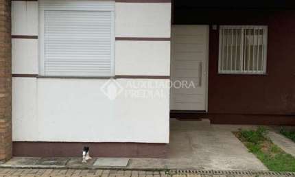 Casa em condomínio fechado com 2 quartos à venda na Rua Ricardo Bandeira Bressani, 120, Jardim dos Lagos, Guaíba, 47 m2 por R$ 196.000