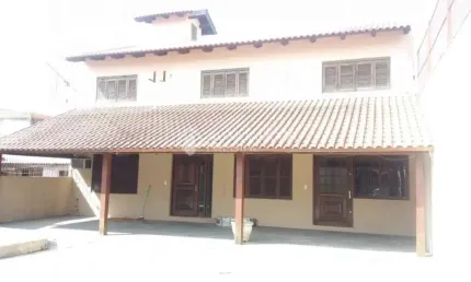 Casa em condomínio fechado com 2 quartos à venda na Rua Bento Gonçalves, 333, Centro, Guaíba, 180 m2 por R$ 1.272.000