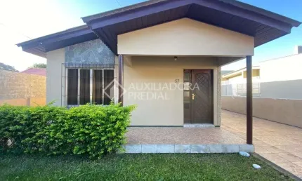 Casa em condomínio fechado com 3 quartos à venda na OSVALDO POETA, 57, Centro, Guaíba, 127 m2 por R$ 450.000