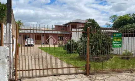 Casa com 3 quartos à venda na Rua Arnaldo Tolotti, 23, Centro, Guaíba, 143 m2 por R$ 570.000