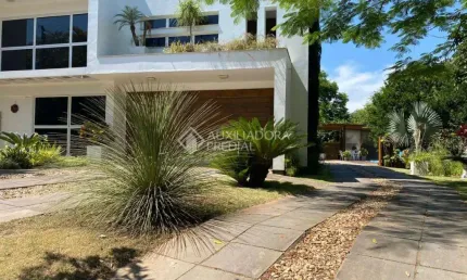 Casa em condomínio fechado com 4 quartos à venda na BORREGARD, 355, Alegria, Guaíba, 400 m2 por R$ 1.990.000